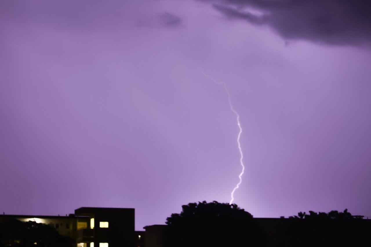 Scenic view of lightning at dusk