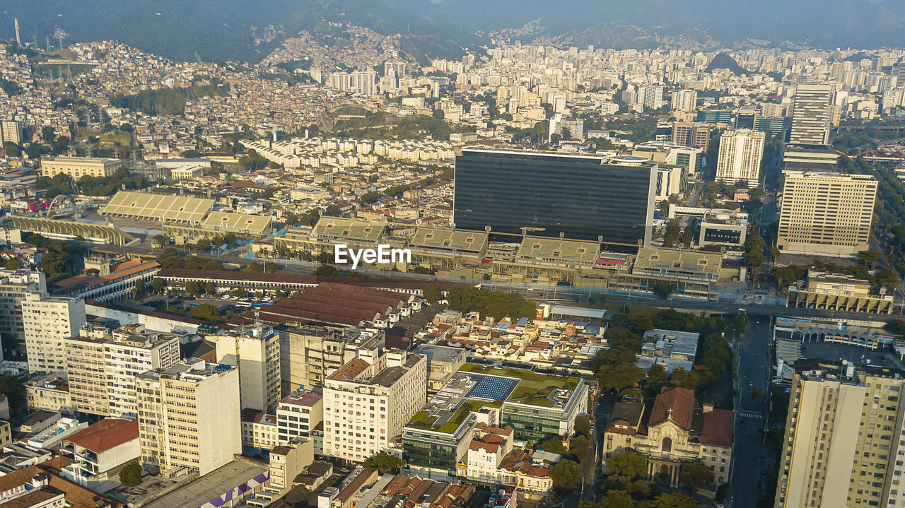 High angle view of buildings in city against sky