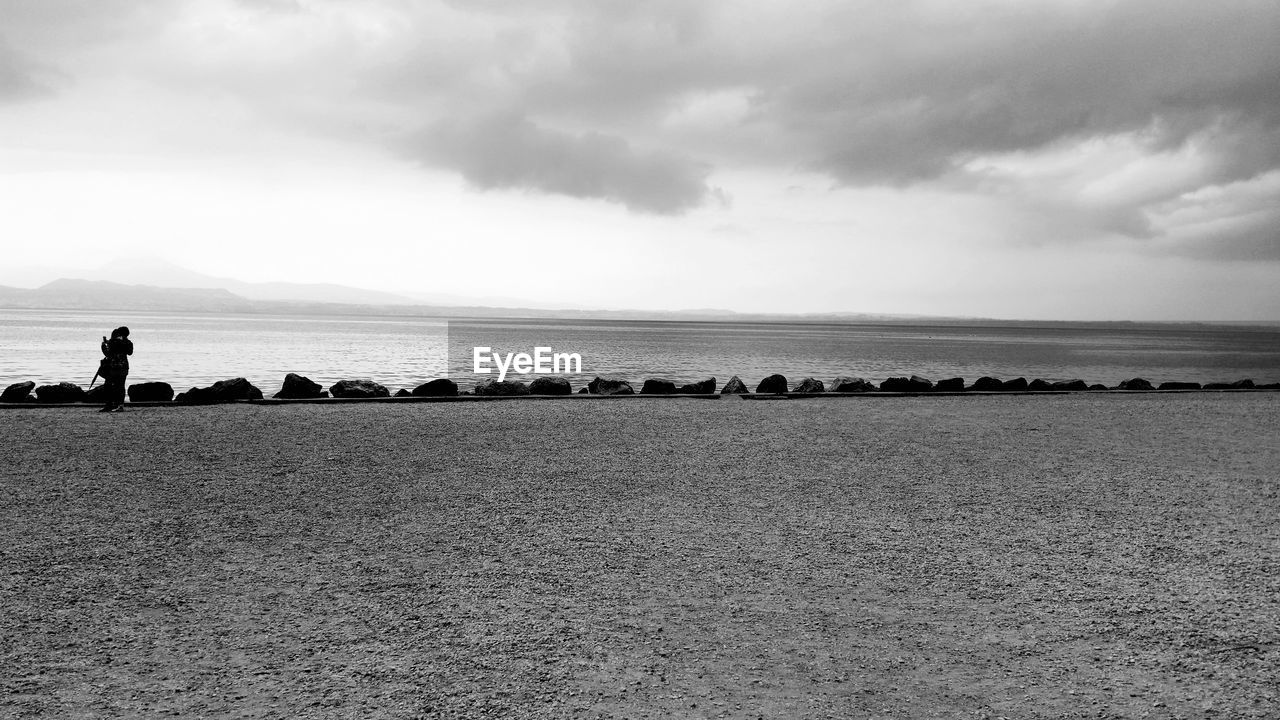 GROUP OF PEOPLE ON BEACH