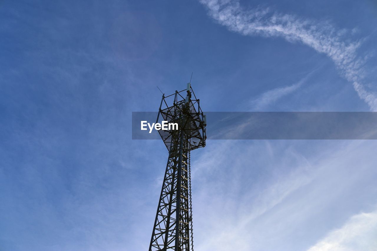 LOW ANGLE VIEW OF COMMUNICATIONS TOWER