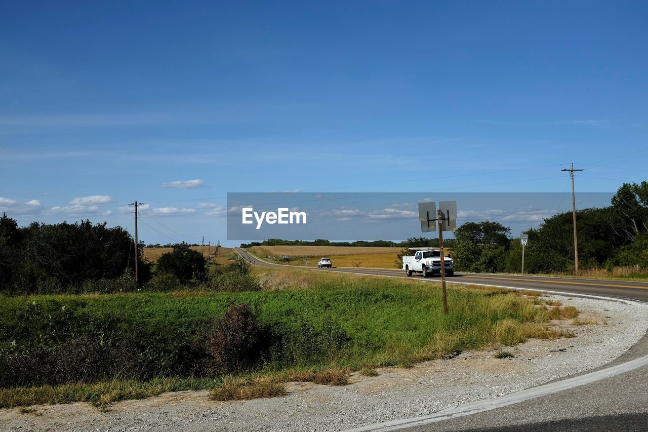 Car on country road against sky