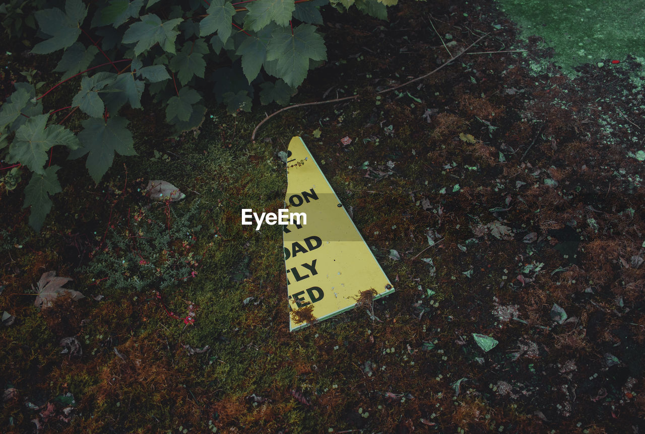 HIGH ANGLE VIEW OF SIGN ON FIELD