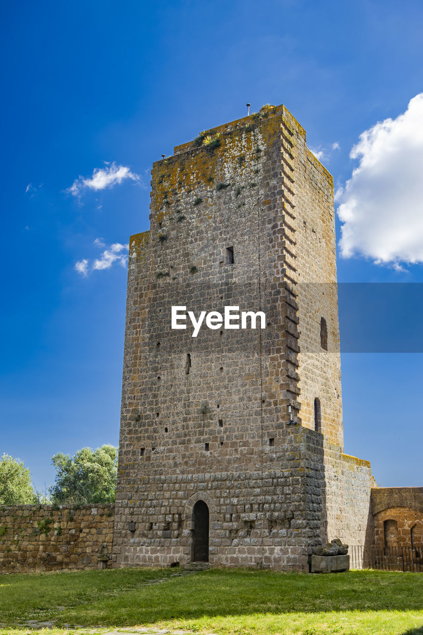 old ruins against blue sky