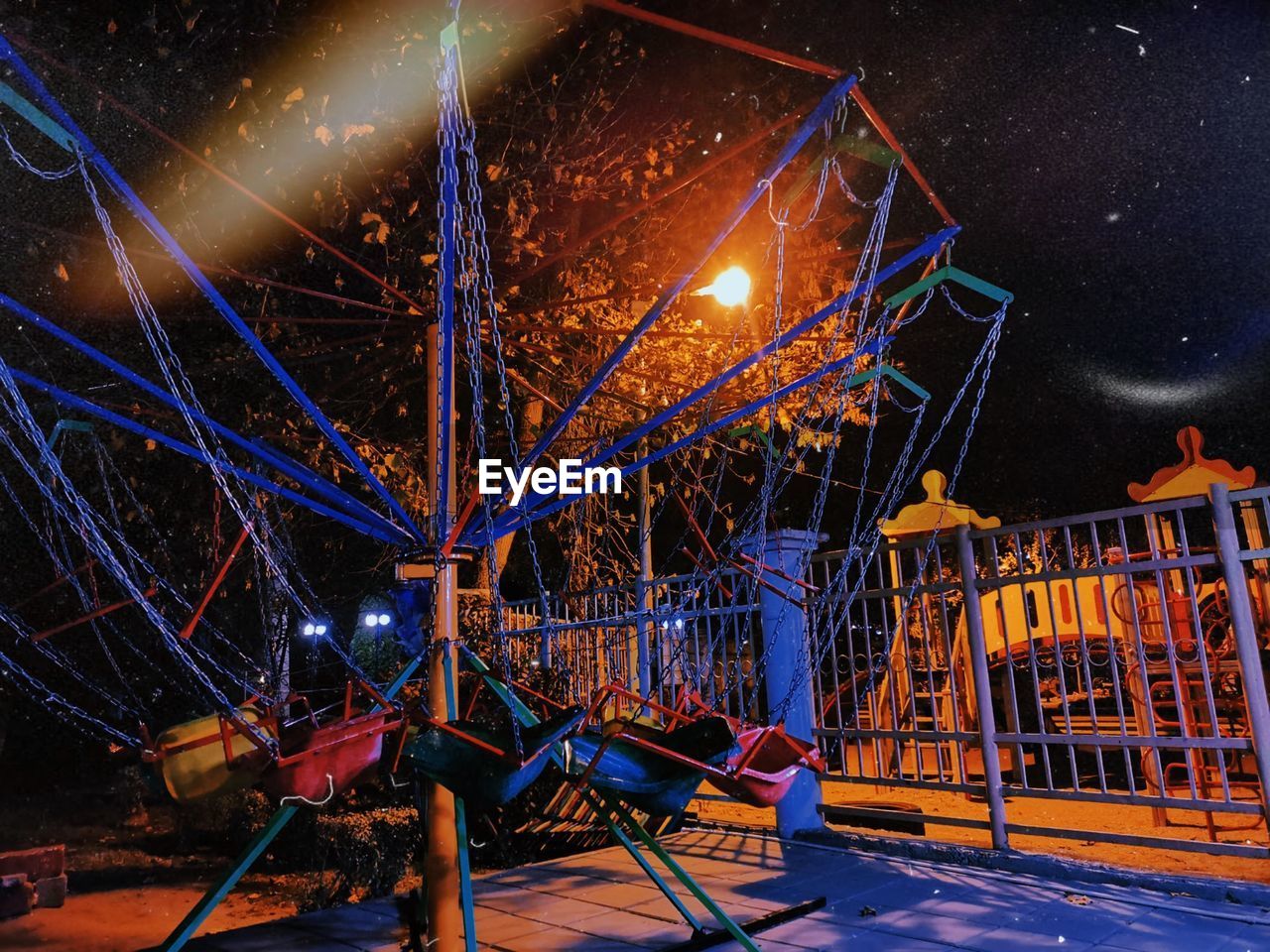 View of amusement park at night