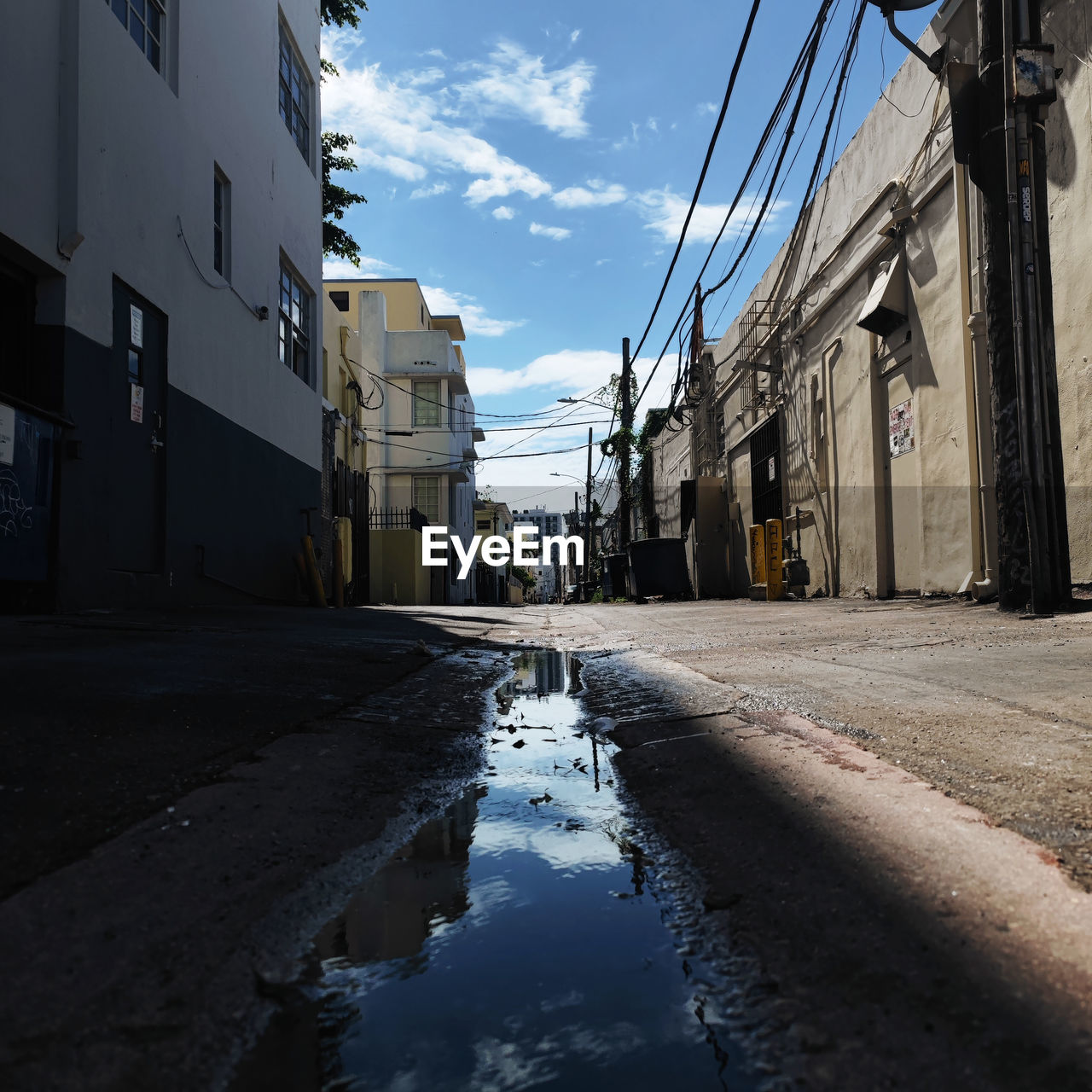 Road amidst buildings in city