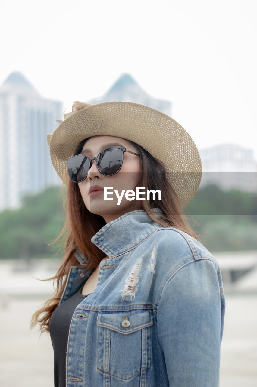 Young woman wearing hat