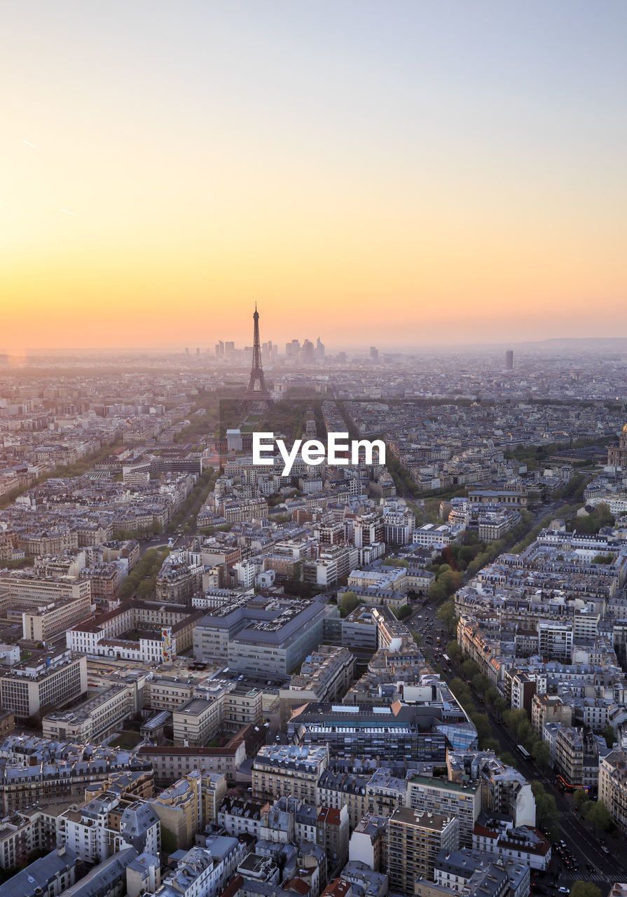 High angle view of cityscape against sky during sunset