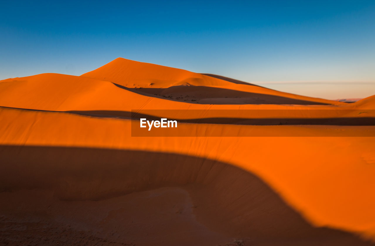 Scenic view of desert against sky