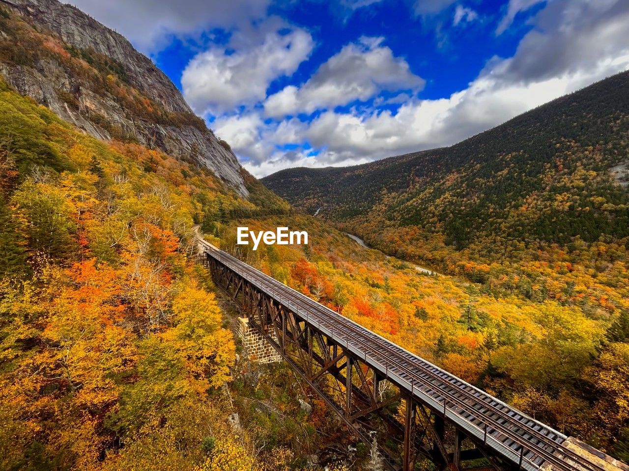 scenic view of mountains against sky during autumn