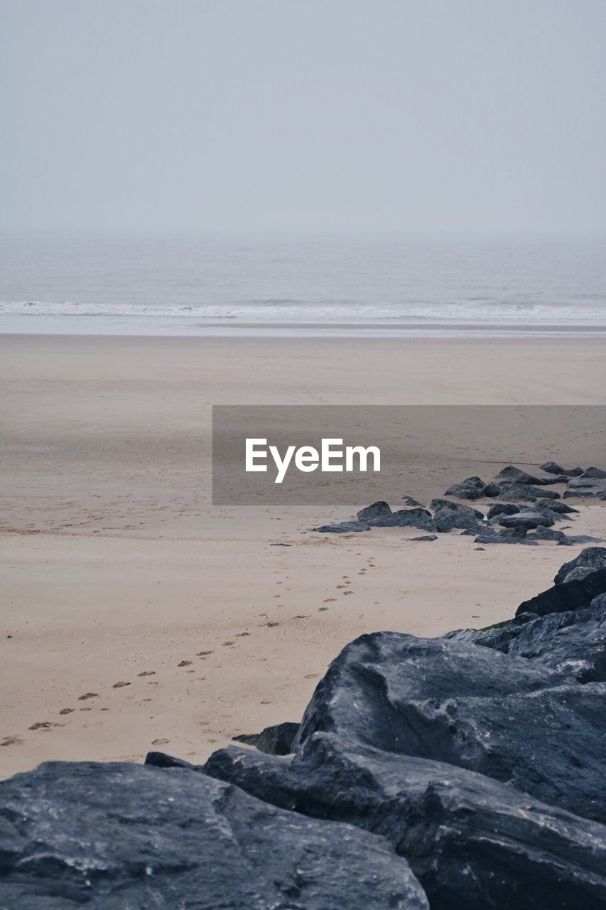 Scenic view of beach against sky