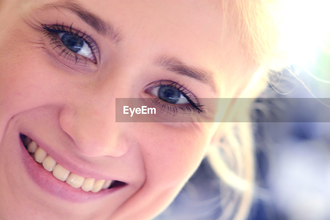 Close-up portrait of smiling woman