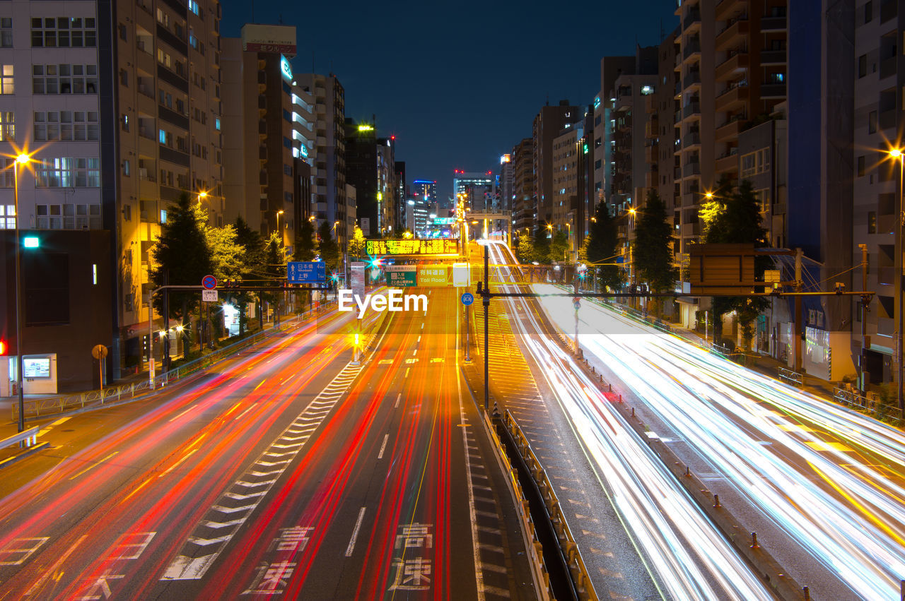 Light trails on city street at night