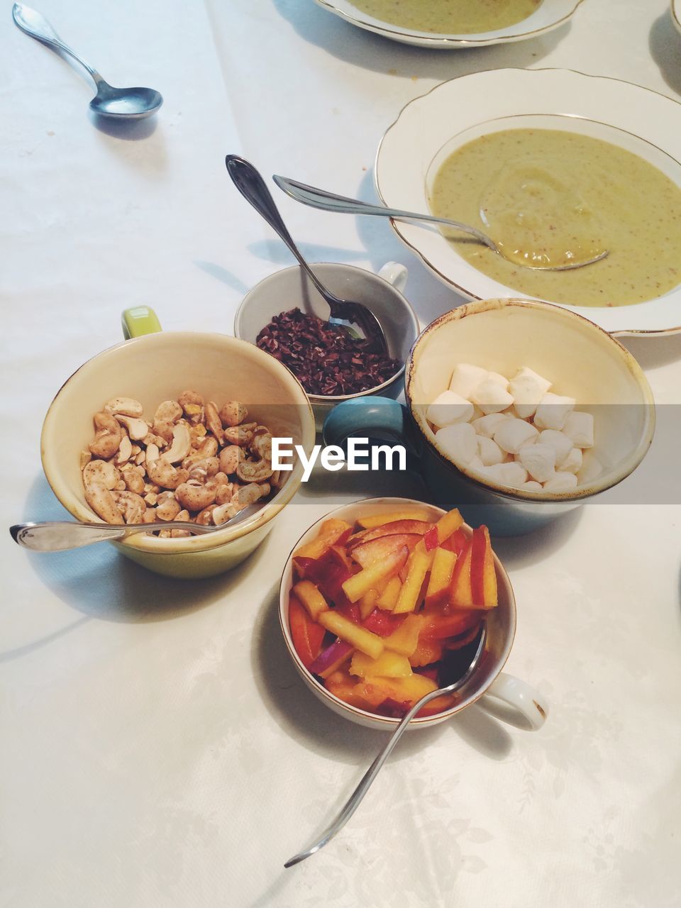 High angle view of various ingredients in bowls on table