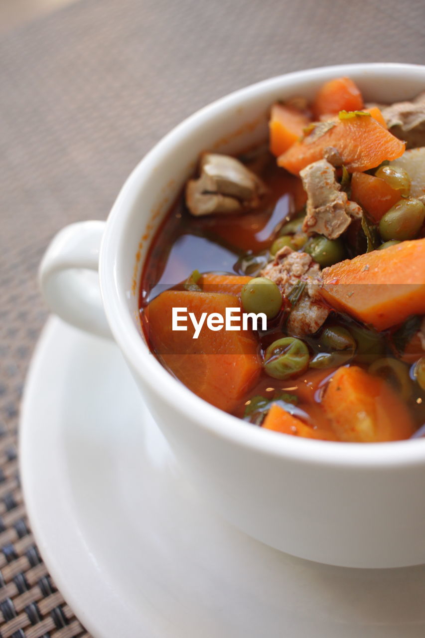 CLOSE-UP OF SOUP SERVED IN BOWL