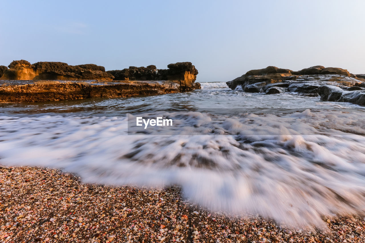 Scenic view of sea against clear sky