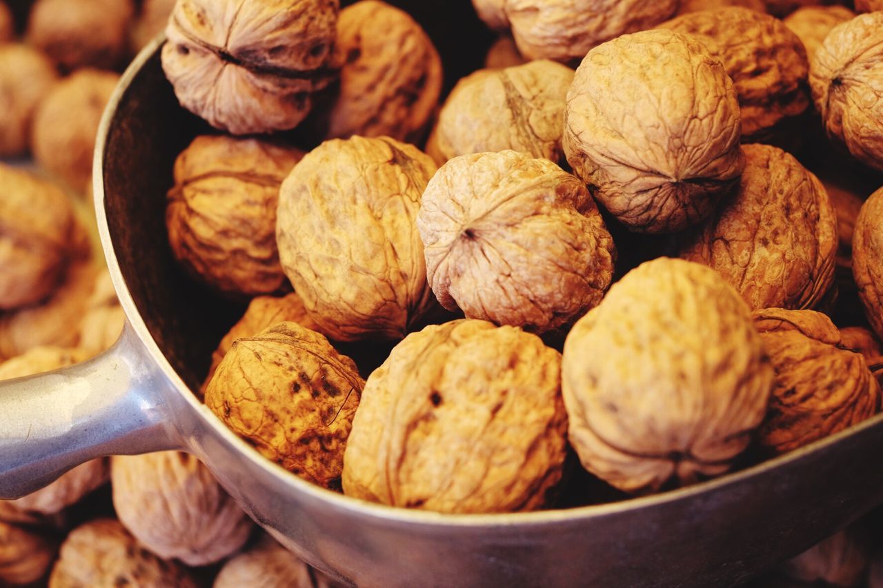 Close-up of walnuts in scoop