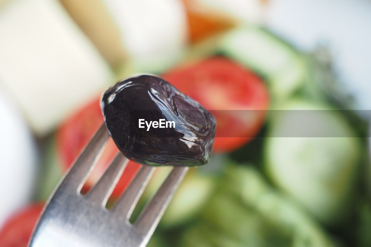 food, food and drink, kitchen utensil, eating utensil, produce, healthy eating, close-up, fork, vegetable, freshness, wellbeing, focus on foreground, red, fruit, no people, indoors, household equipment, selective focus, plant