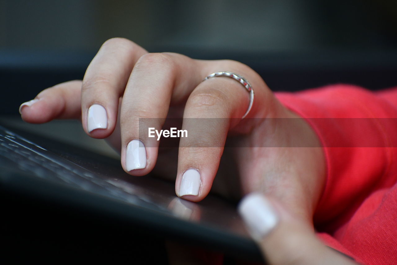 Close-up of woman using laptop 