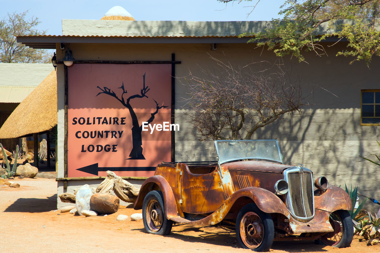 Solitaire country lodge colorful building and vintage car. africa