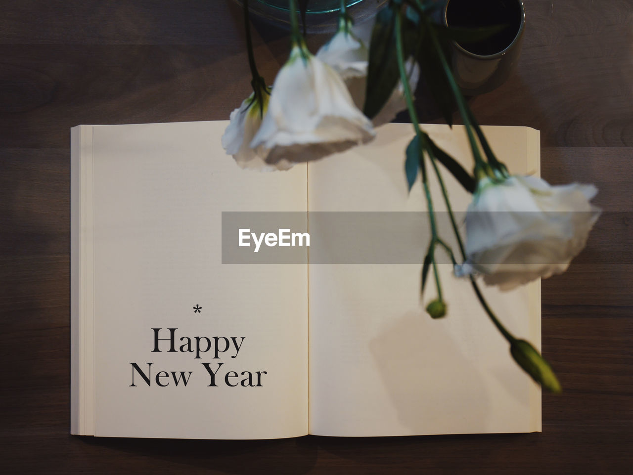 High angle view of book on table