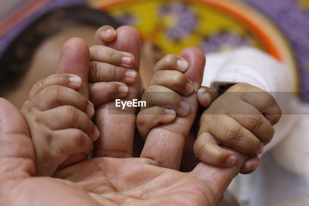 Close-up of holding hands