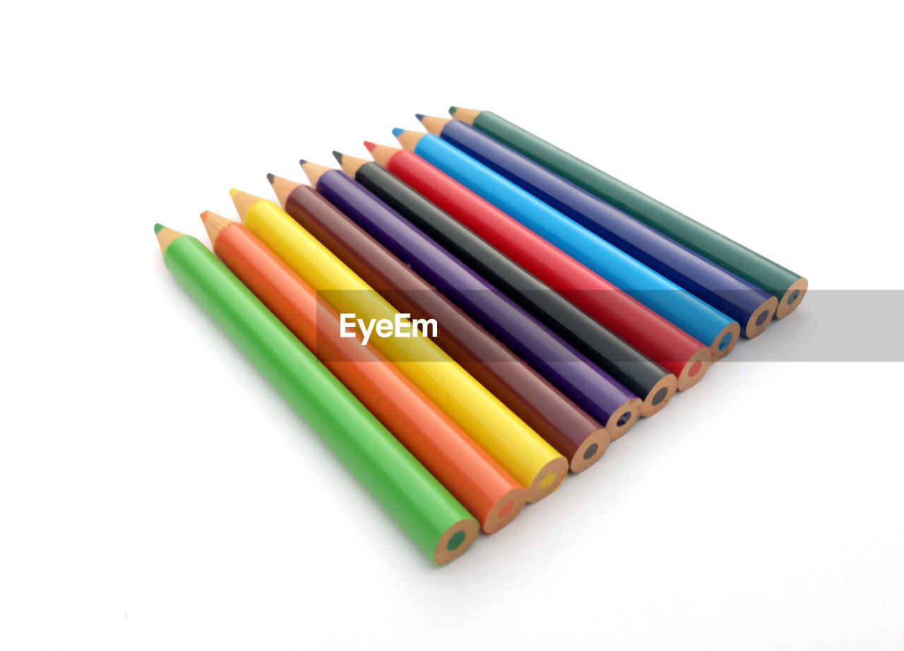 HIGH ANGLE VIEW OF COLORED PENCILS