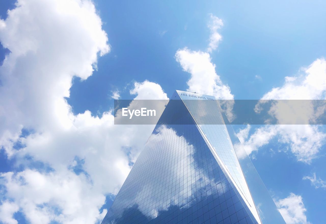 Low angle view of modern building against sky freedom tower new york city