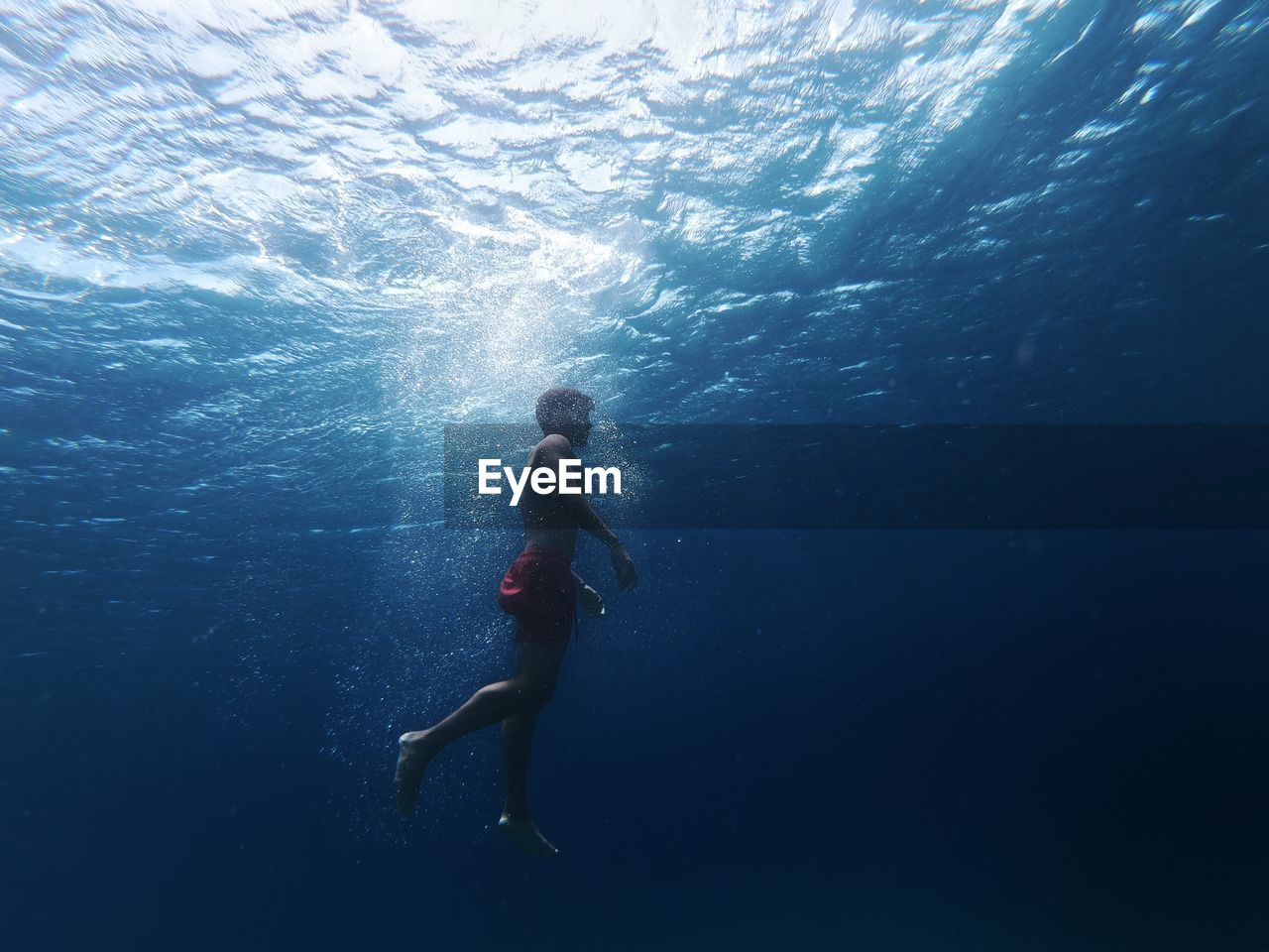 Man swimming in sea