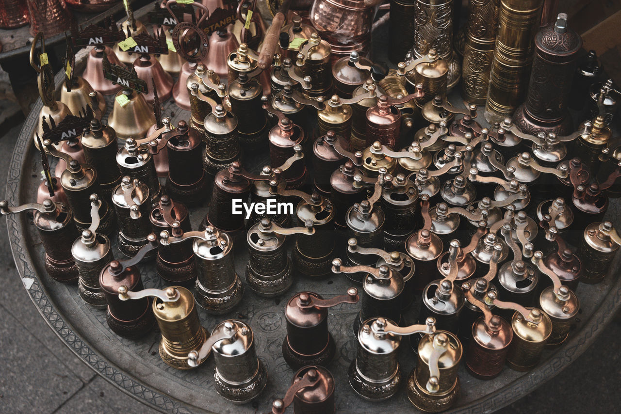 High angle view of coffee grinders for sale at market stall