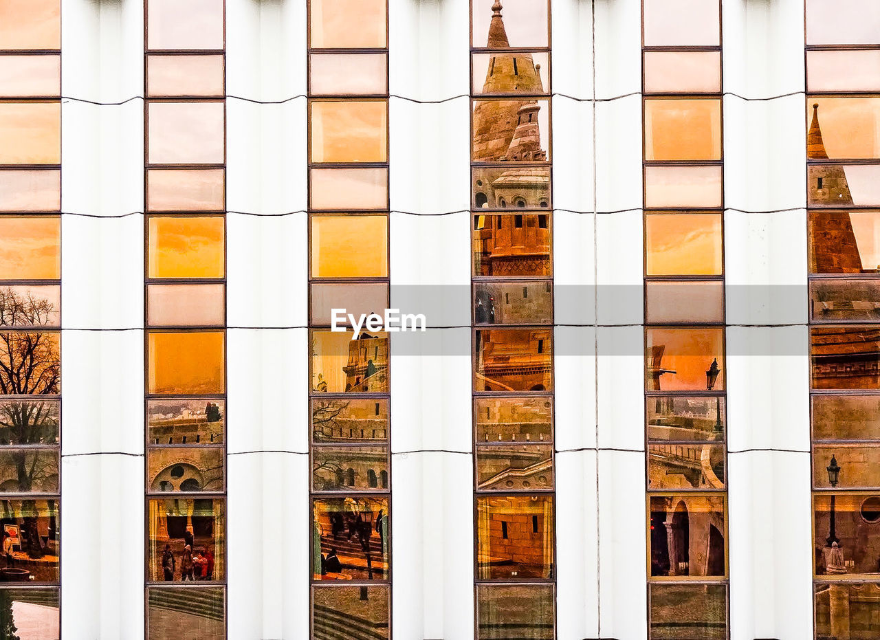 CLOSE-UP OF WINDOWS IN A ROW