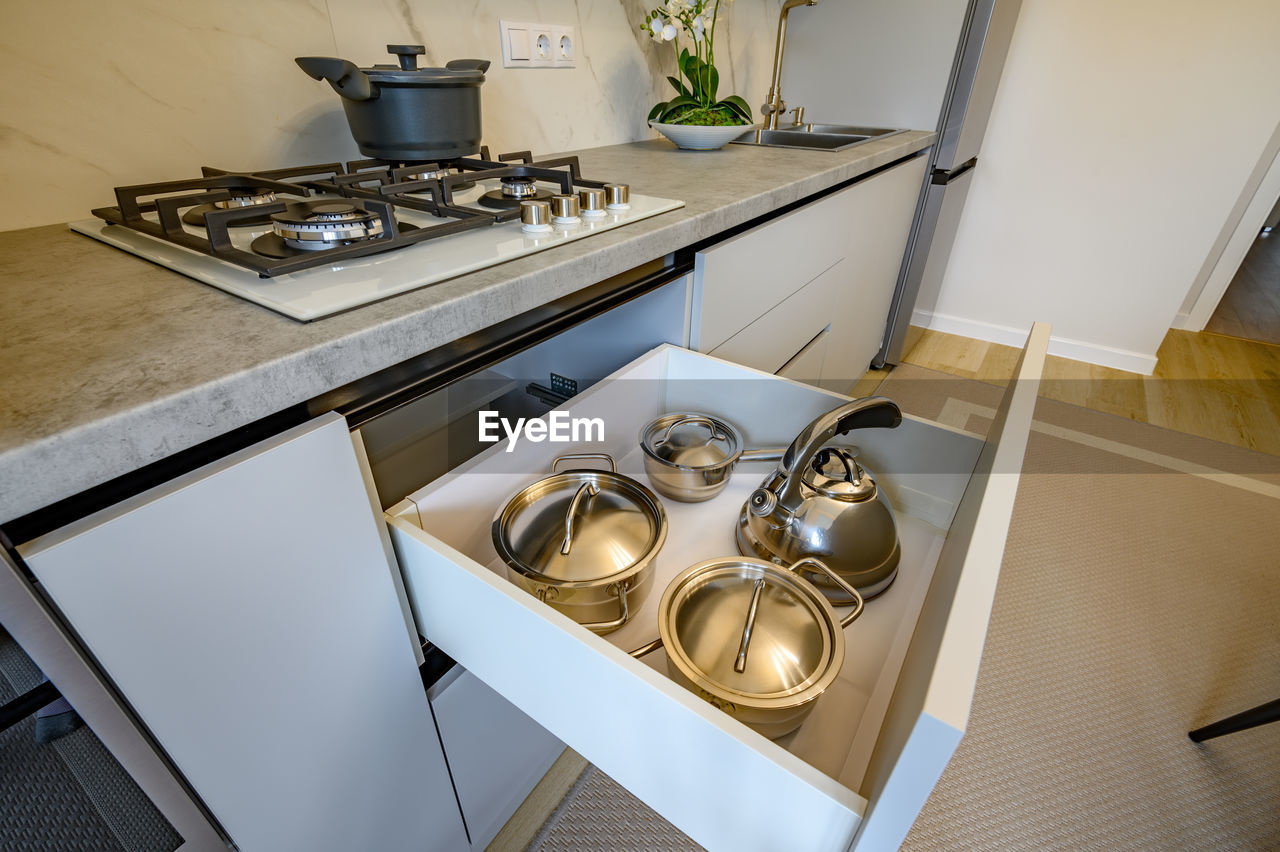 High angle view of cooking utensils in drawer