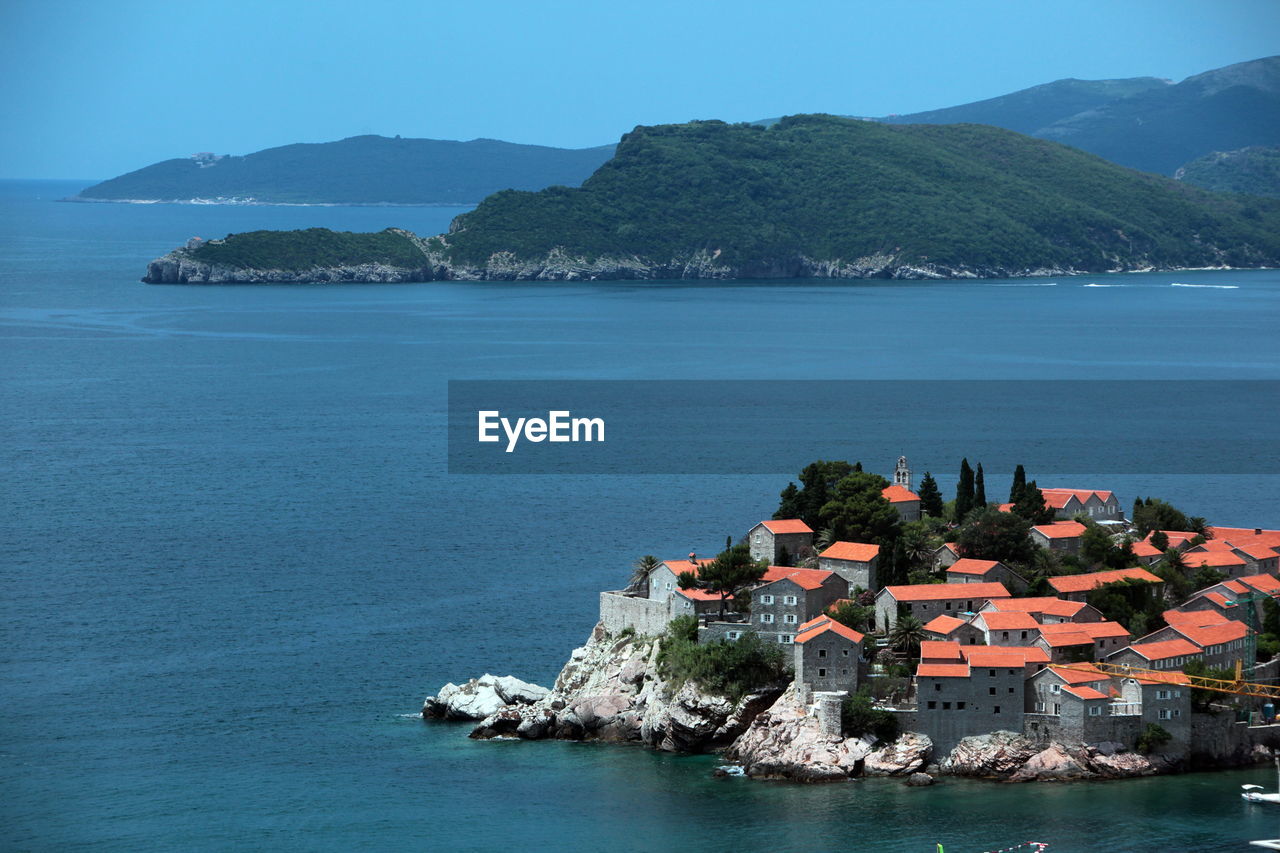 High angle view of houses on coast