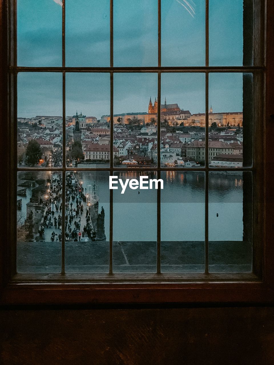 Buildings seen through glass window 