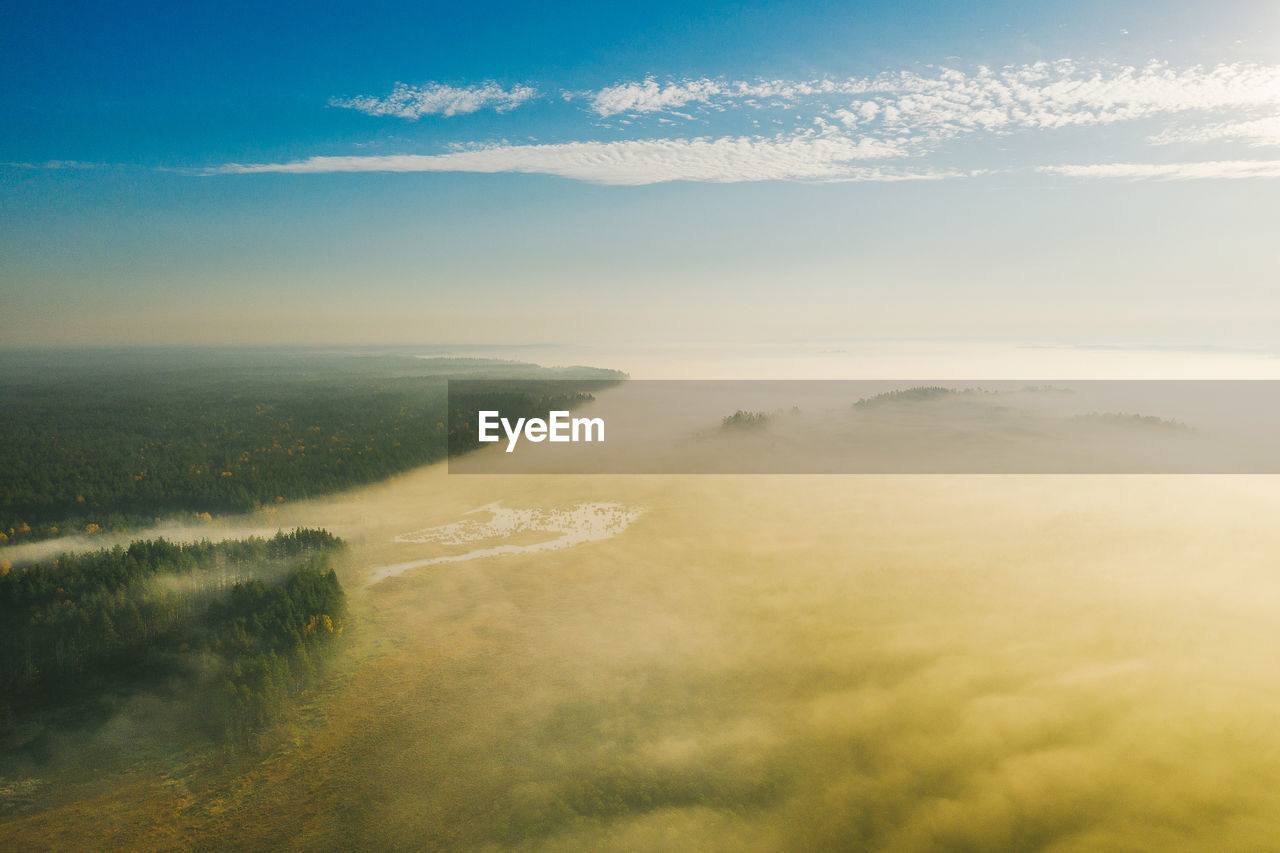 AERIAL VIEW OF LANDSCAPE AND FOG