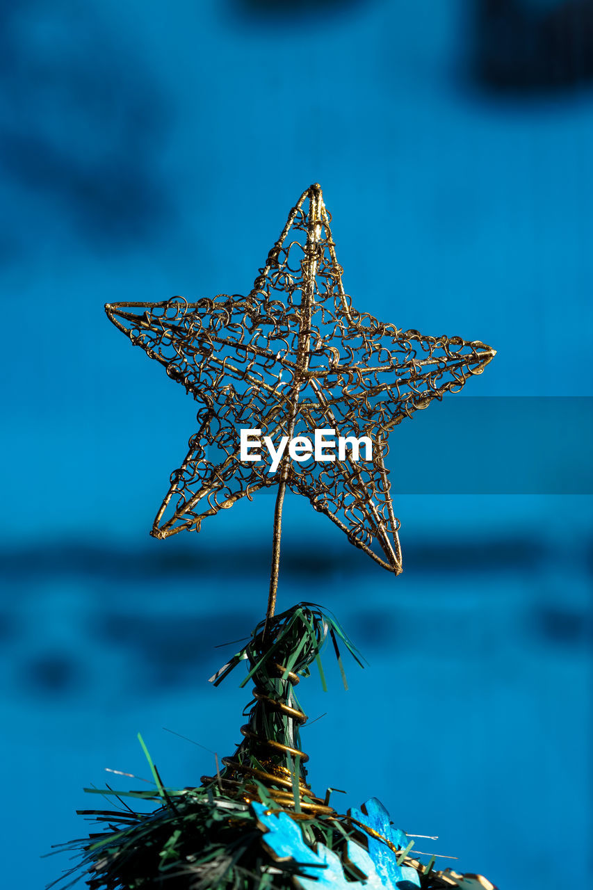 Close-up of christmas tree topper