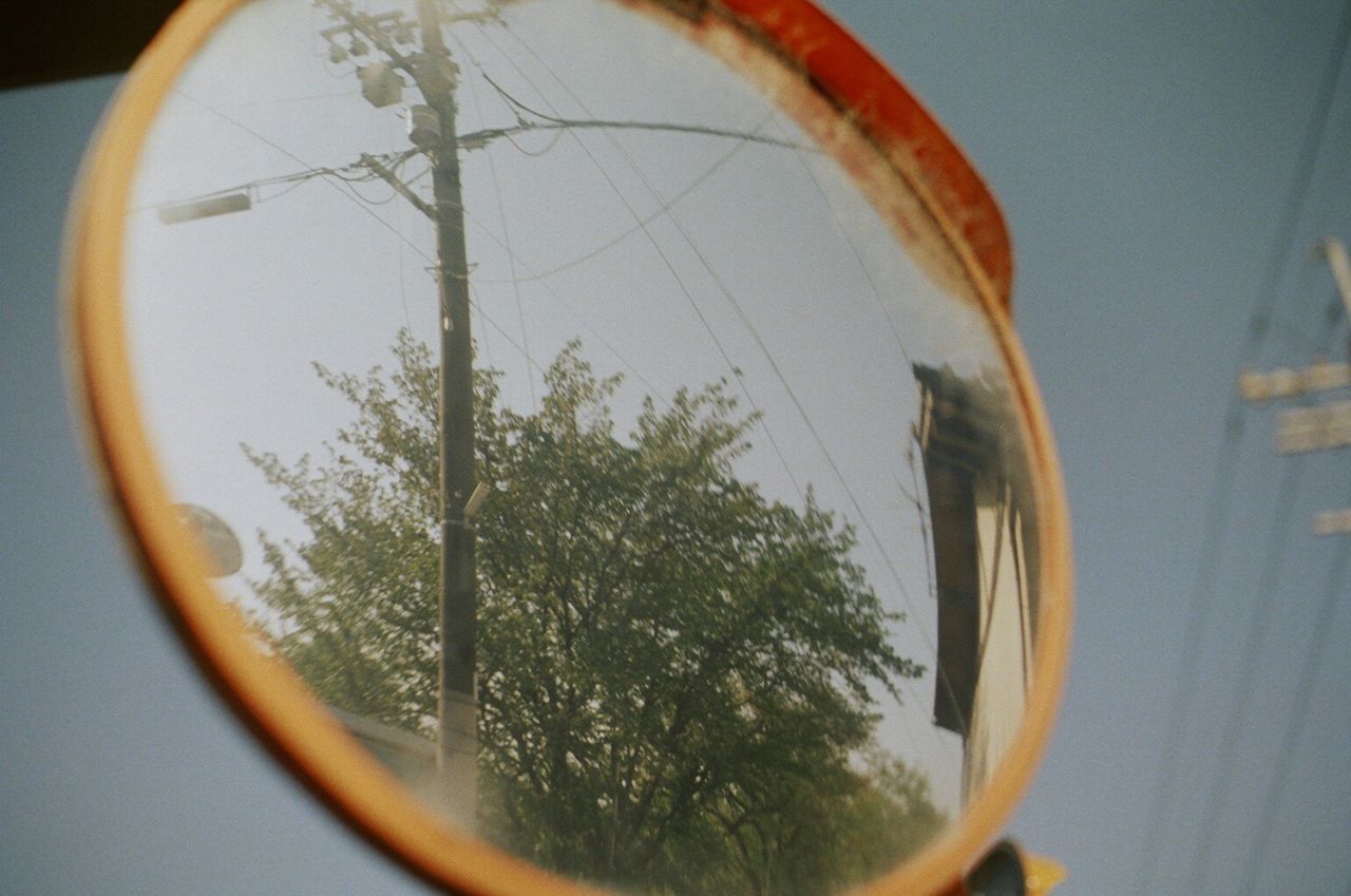 Close-up of reflections in mirror