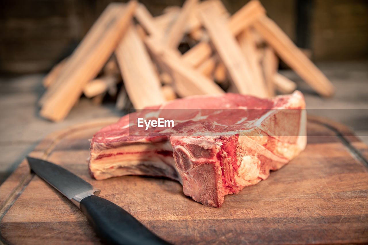 Italian steak ready to be cooked on a barbecue. appetizing piece of meat ready to be set on bbq fire