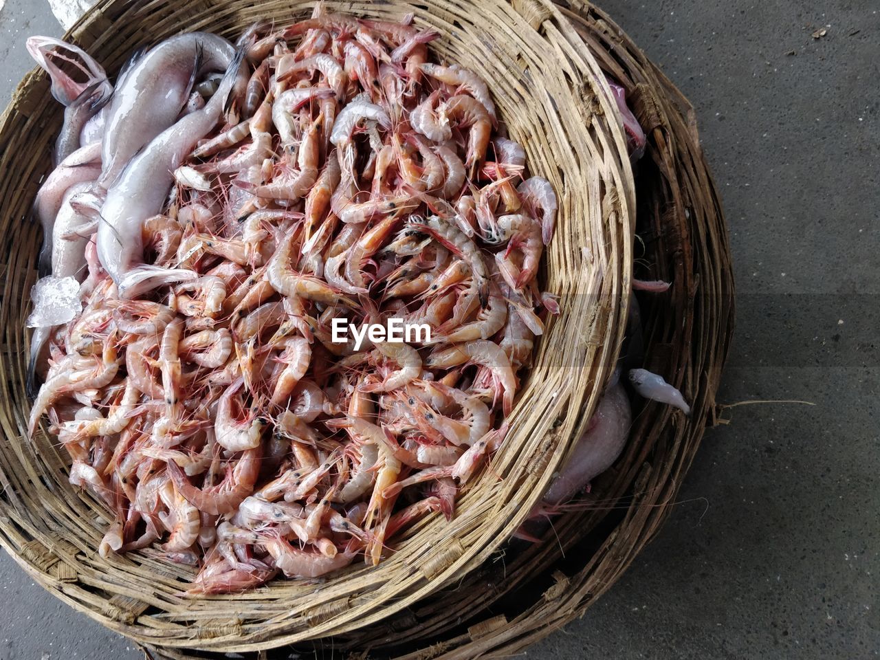 High angle view of fish in basket for sale