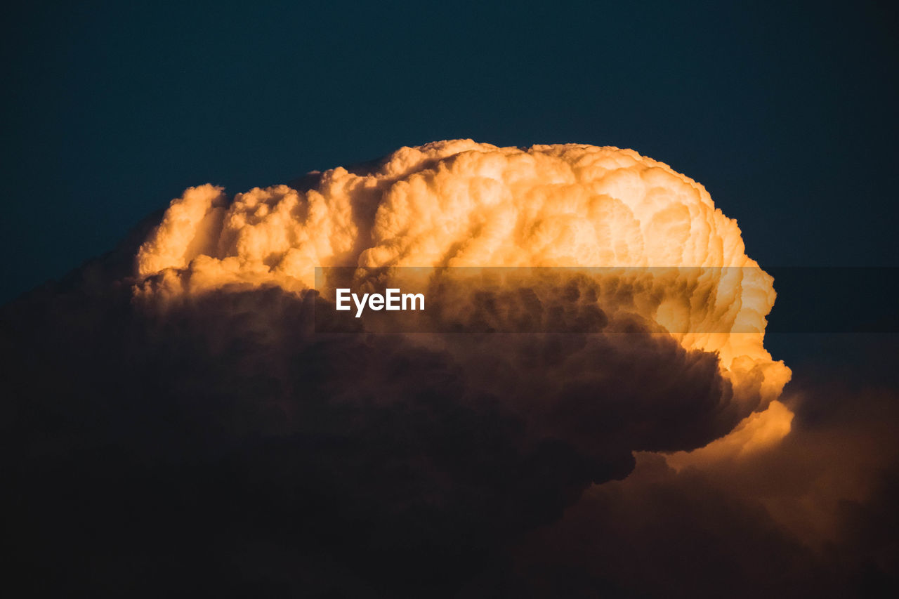 Low angle view of cloudy sky during sunset