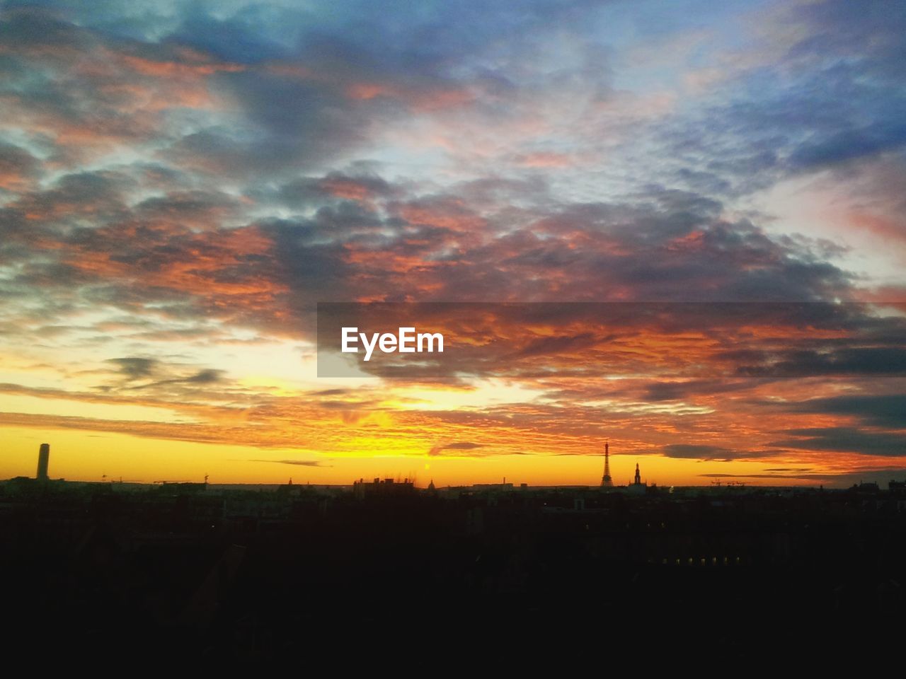 SCENIC VIEW OF DRAMATIC SKY DURING SUNSET