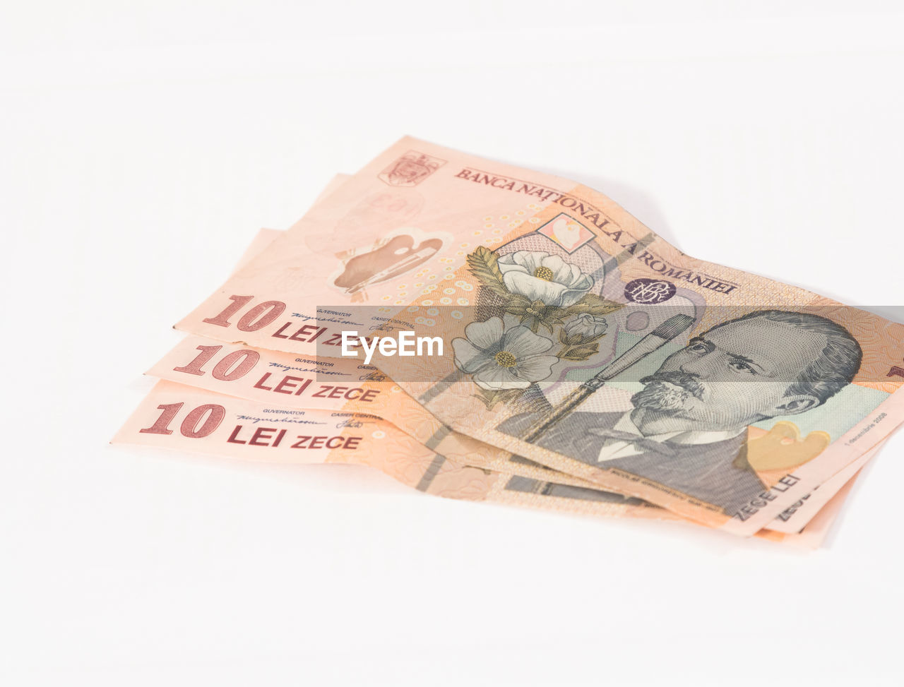 Close-up of paper currency on white background