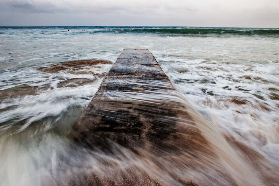 WAVES SPLASHING ON SHORE