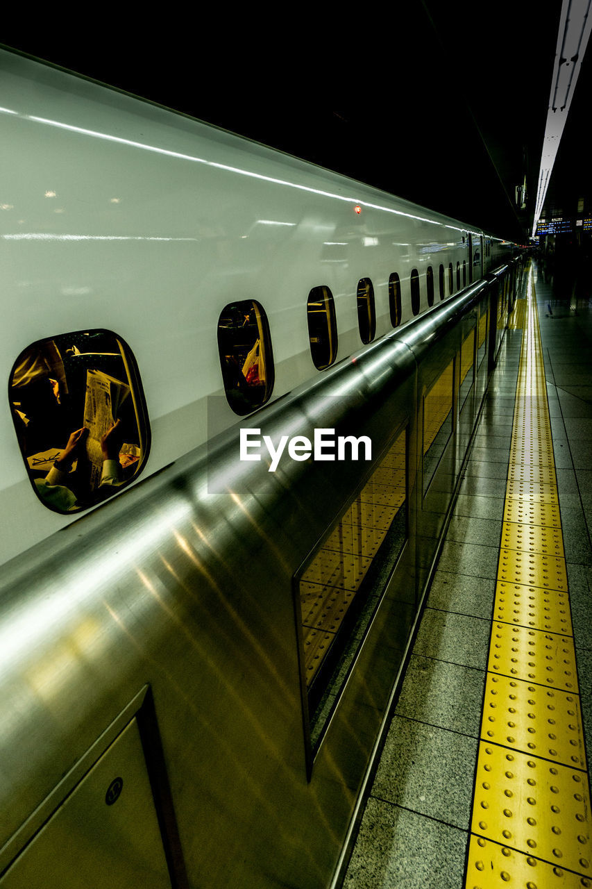 TRAIN AT RAILROAD STATION