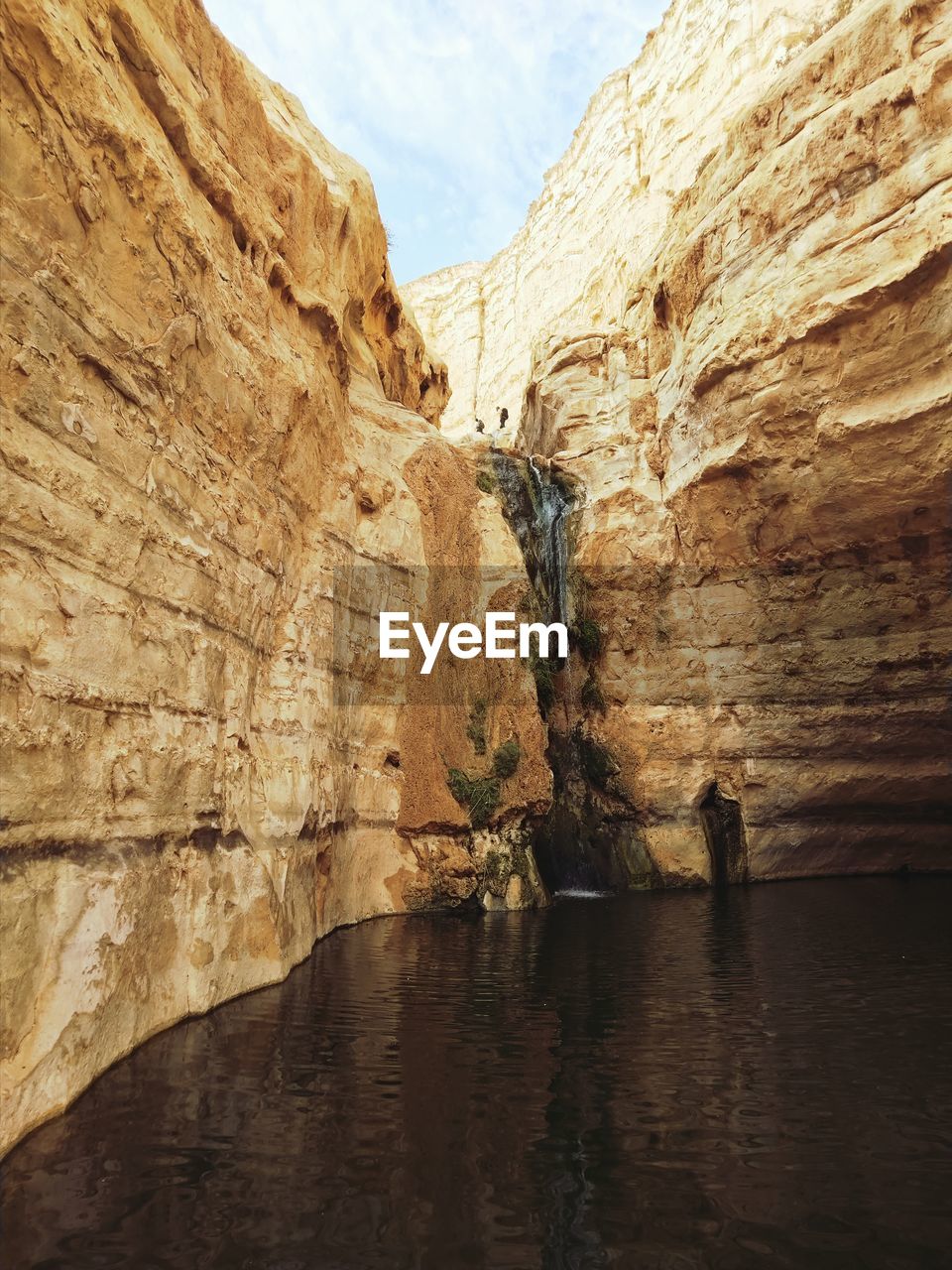 Scenic view of rock fountain against sky 