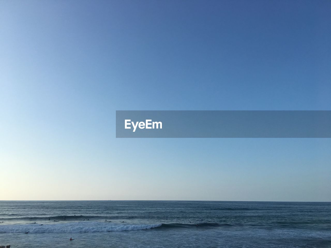 SCENIC VIEW OF BLUE SEA AGAINST CLEAR SKY