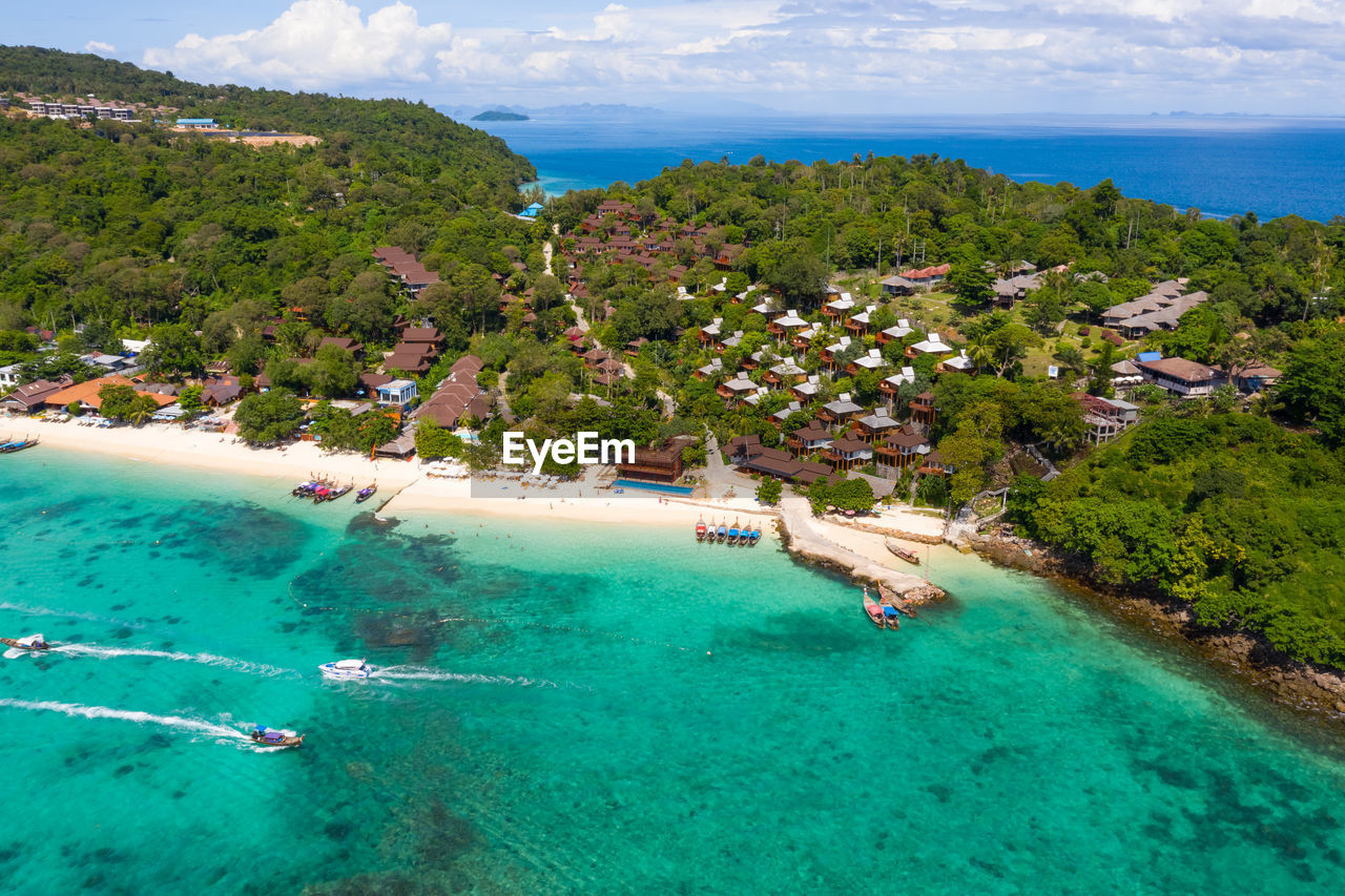 Phi phi island and resort and tourist boat at krabi thailand aerial view