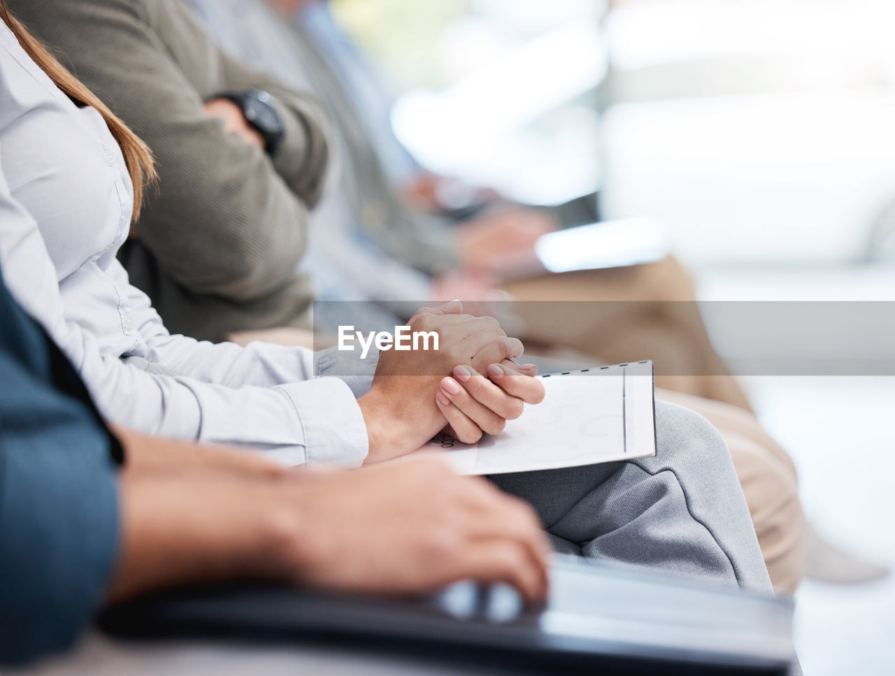 midsection of woman using laptop at table