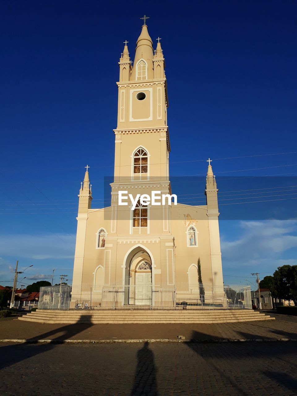 LOW ANGLE VIEW OF CHURCH AGAINST BUILDING