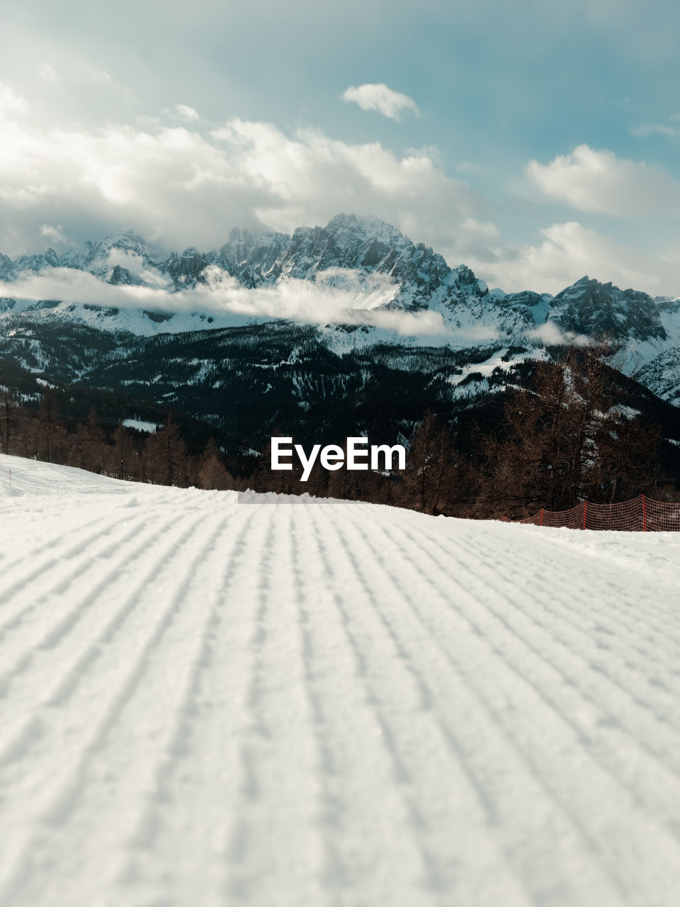 snow, winter, cold temperature, environment, mountain, landscape, cloud, scenics - nature, sky, beauty in nature, nature, mountain range, snowcapped mountain, land, no people, tranquil scene, tranquility, white, day, travel, outdoors, piste, travel destinations, non-urban scene, frozen, plant, rural scene, sunlight, tourism