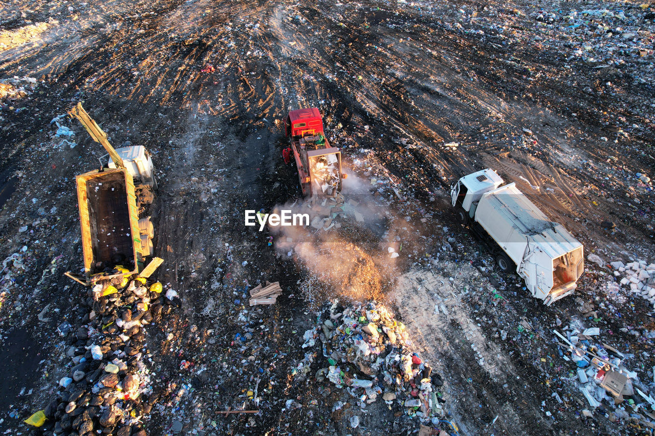 Landfill waste disposal. garbage dump with waste plastic. garbage truck unload rubbish in landfill. 